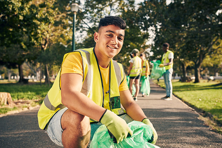 Work for the Dole - man picking trash